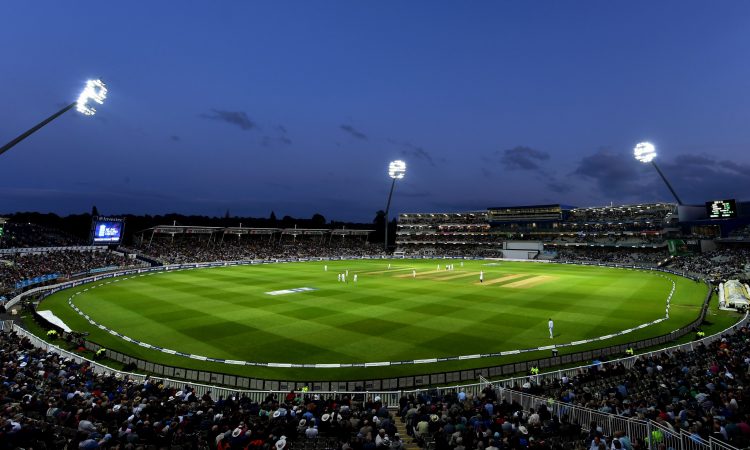 Evening Cricket Match under FloodLights at Stadium with Crowd