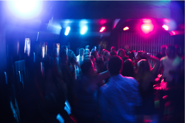 Clubbers at Nightclub, Bright Coloured Lights